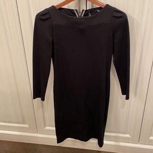 Black long sleeve Alice and Olivia dress with special detail on the back top